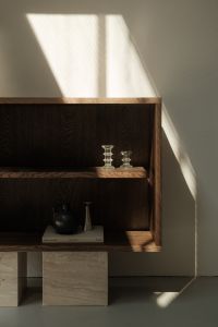 Kaboompics - Modern Dark Wood Shelving Unit Styled with Glass Candle Holders