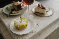 Kaboompics - White Cake with Wine Glasses on a Travertine Table