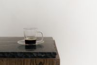Kaboompics - Black Coffee in Glass Cup on Black Slate Table