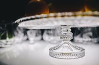 Kaboompics - Crystal Cake Stand and Cut Glassware on Display