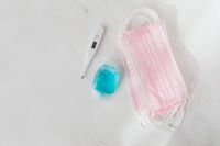 Kaboompics - Hygiene Supplies Flat Lay with Mask, Thermometer and Sanitizer