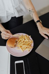 Kaboompics - Overhead View of Burger, Fries and Laptop at Work