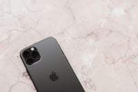 Kaboompics - Partial Apple iPhone 11 Pro on Pink Marble