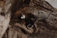 Kaboompics - Silver Rings on Rough Bark, Rustic Jewelry Still Life