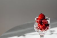 Kaboompics - Raspberries In Cut Glass With Dark Background