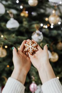Kaboompics - Woman Holding Gingerbread Cookie with Tree