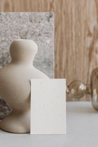 Kaboompics - Horizontal Blank Business Card with Textured Ceramic Vase and Marble Backdrop, Neutral Product Styling