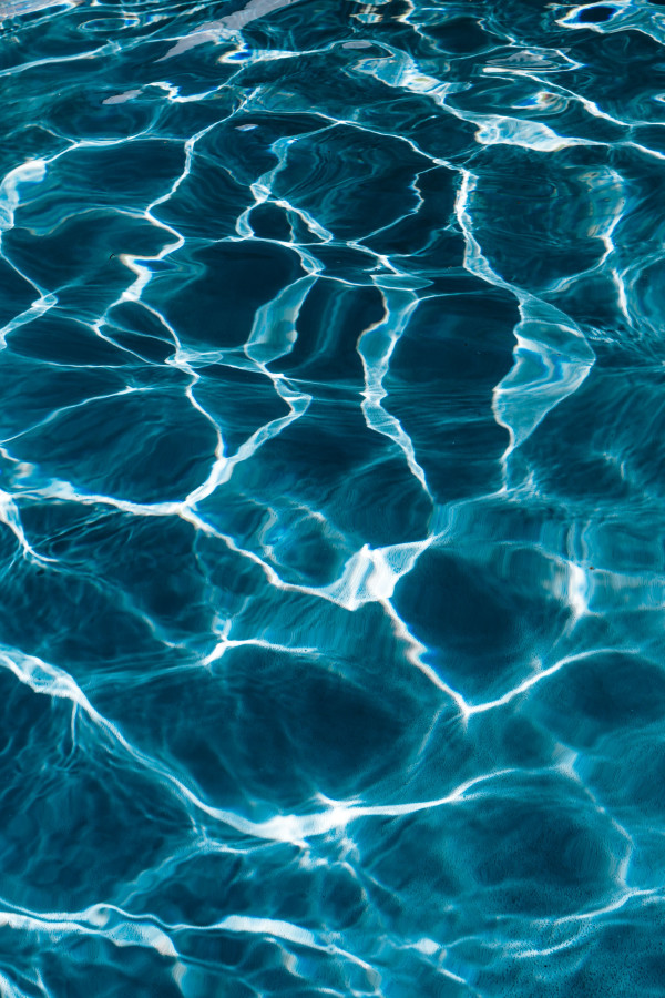 Vertical Aqua Pool Water with Crisp White Sun Patterns for Summer ...
