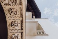 Kaboompics - Close-Up of Carved Stone Flowers on Krakow Facade
