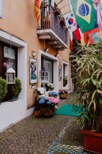 Kaboompics - Residential houses with arches & flags