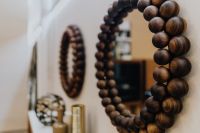 Kaboompics - Round Wooden Bead Mirror in Modern Interior, Home Decor Detail