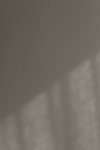 Kaboompics - Soft Gray Plaster Texture with Subtle Light Falloff