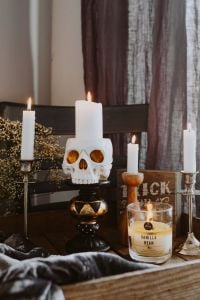 Kaboompics - Close-Up Halloween Skull Candle with Candles and Vanilla Candle