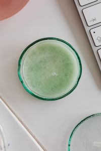 Kaboompics - Close-Up of Green Laboratory Petri Dish and Keyboard