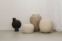 Kaboompics - Neutral Ceramic Vase Arrangement with Black and Textured Vessels