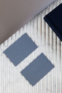 Kaboompics - Blue Business Card Mockup beside Cropped Laptop and Planner on Marble