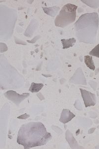 Kaboompics - Pale Terrazzo Stone with Large Smoky Gray Pieces on a Soft White Surface