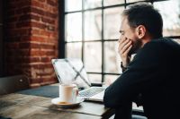 Kaboompics - Young Entrepreneur Working from a Modern Coffee Shop