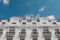 Kaboompics - Historic Madrid Building Facade with Repeating Windows and Balconies