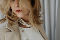Kaboompics - Close-Up of Layered Pearls, White Top and Beige Blazer