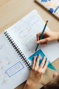 Kaboompics - Young Student Solving Geometry Problem at Home