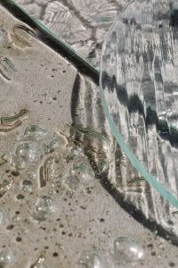Kaboompics - Close-Up of Curved Ribbed Glass over Bubble Texture