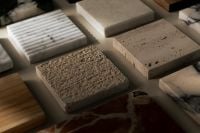 Kaboompics - Neutral Material Moodboard with Ribbed Marble, Travertine and Stone Samples