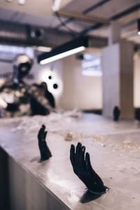 Kaboompics - Metal figures by a table full of metal shavings