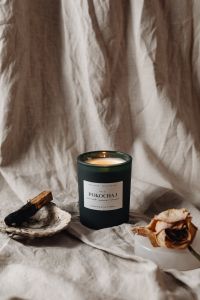 Kaboompics - Black Jar Candle With Palo Santo And Dried Flowers