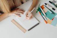 Kaboompics - Overhead View of Designer Sketching with Markers, Ruler and Color Swatches