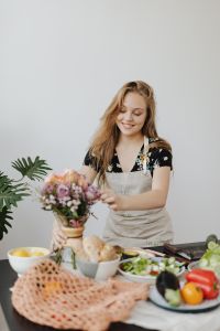 Kaboompics - Kitchen Table Styling with Pastel Bouquet, Bread and Vegetables