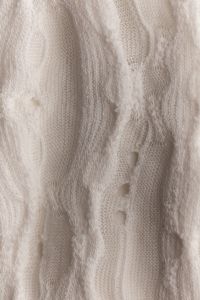 Kaboompics - Close Up of Cream Knitted Textile Pattern