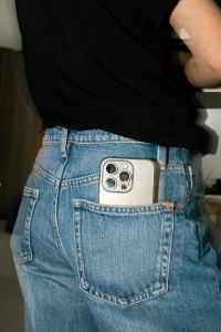 Kaboompics - Hard Flash Photography of Smartphone in Jeans Pocket