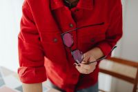 Kaboompics - Close-Up of Woman Holding Glasses and Pencil over Notebook, Home Office Break
