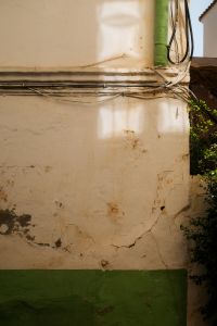Kaboompics - Weathered Plaster Wall with Green Base