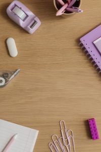 Kaboompics - Pastel Desk Accessories on Wooden Surface