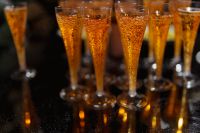 Kaboompics - Aperol Spritz Glasses Reflected on a Dark Table
