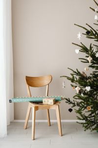 Kaboompics - Minimal Christmas Tree beside Chair and Gift