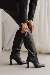 Kaboompics - Black Satin Pants and Over-the-Knee Boot Close-Up