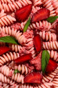 Kaboompics - Close-Up of Pink Fusilli With Strawberries and Mint