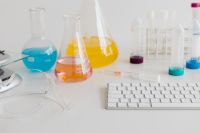 Kaboompics - Chemistry Lab Glassware and Test Tubes at Computer Workstation