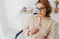 Kaboompics - Close-Up Woman Relaxing beside a Minimal Home Office Desk