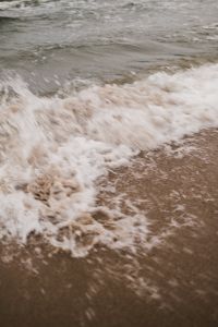 Kaboompics - Close-Up Sea Foam and Sandy Shore