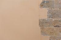 Kaboompics - Minimal Sand Beige Stucco with a Weathered Stone Block Edge, Naples Italy Neutral Wall Background