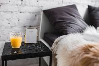 Kaboompics - White brick wall, bed and marble bedside table