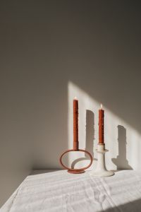 Kaboompics - Minimal Candle Styling on White Linen with Sunlit Shadows and Copy Space