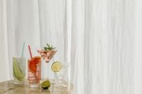 Kaboompics - Green Cocktail with Rosemary on a Round Table