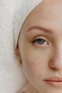 Kaboompics - Close-Up Eye Patch Beneath a Blue Eye in a Beauty Skincare Portrait