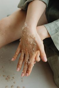 Kaboompics - Massaging Sea Salt Body Scrub between Hands before Exfoliating