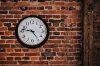 Kaboompics - Fancy interior with a red brick wall and a clock